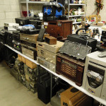 An assortment of record players and vintage speakers